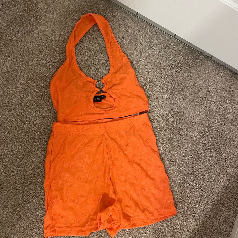 Pretty little thing
CUTE ORANGE TAILGATE/RAVE OUTFIT